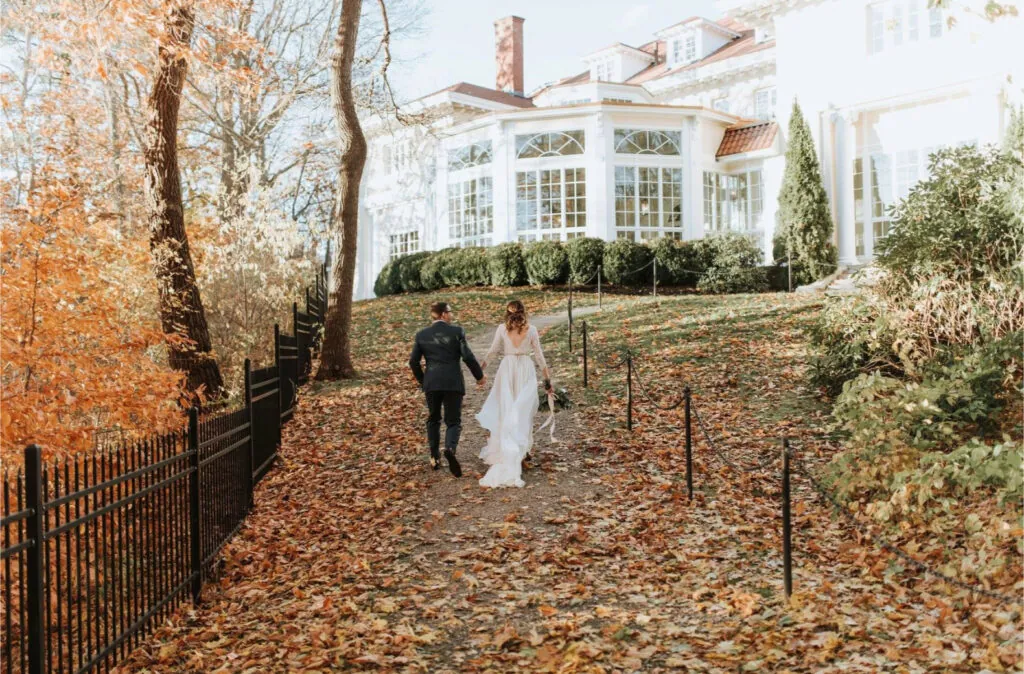Couple walking in fall foliage